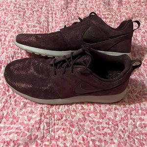 Gorgeous metallic maroon nike shoes. Womens size 9